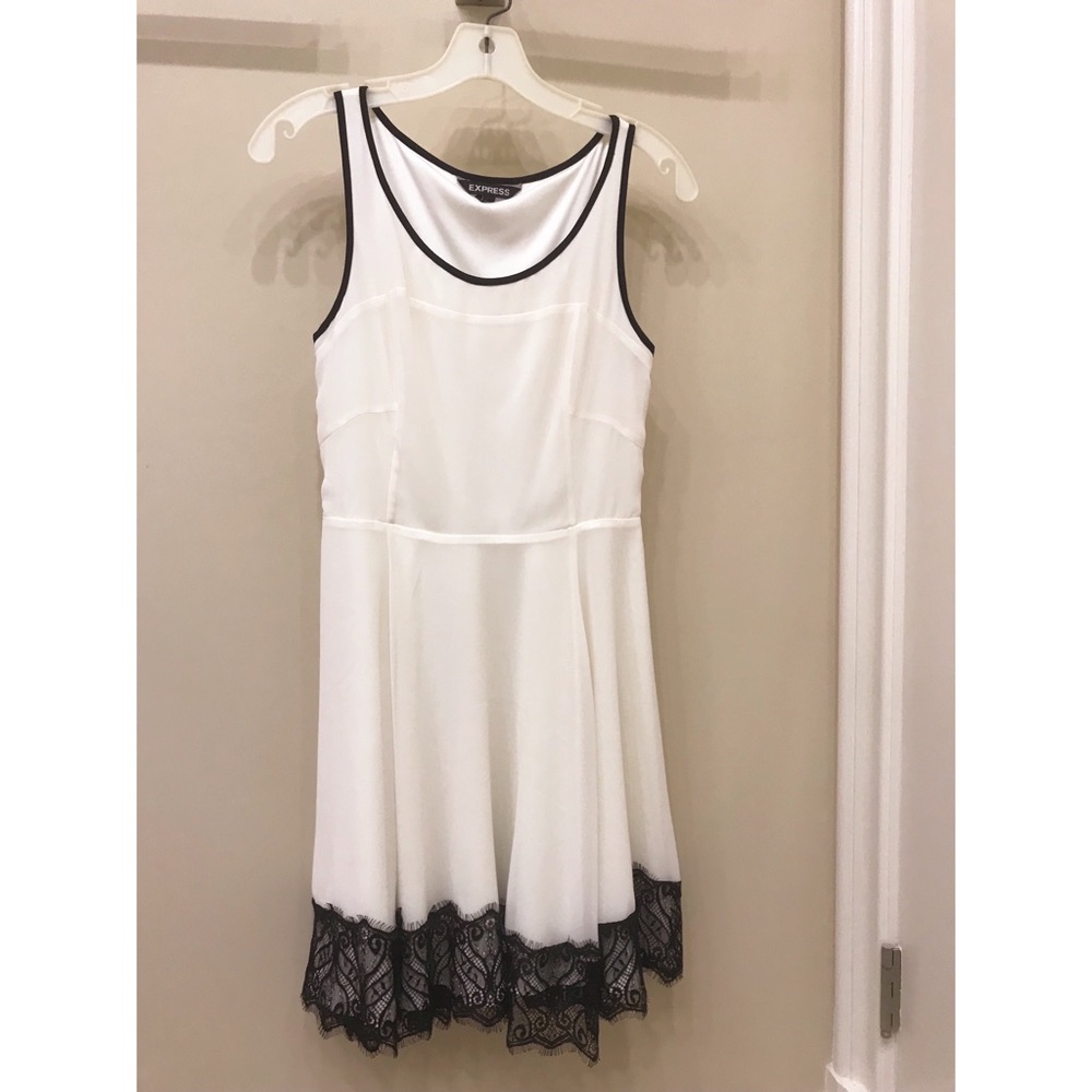 White dress with black lace accent